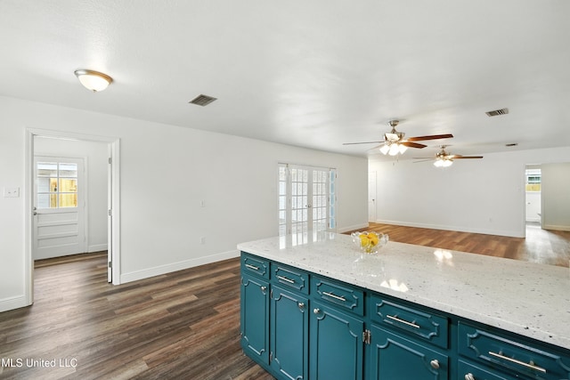 611 E E Lakeshore Dr, Carriere, MS 39426 - kitchen with a ceiling fan and dark wood-type flooring