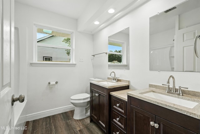 611 E E Lakeshore Dr, Carriere, MS 39426 - full bathroom featuring wood finished floors, two vanities, and recessed lighting