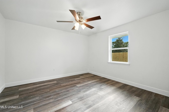 611 E E Lakeshore Dr, Carriere, MS 39426 - unfurnished room featuring a ceiling fan and dark wood-type flooring