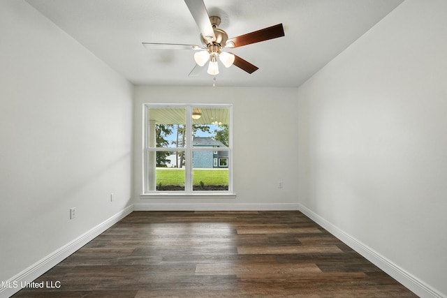 611 E E Lakeshore Dr, Carriere, MS 39426 - spare room with dark wood-type flooring and ceiling fan