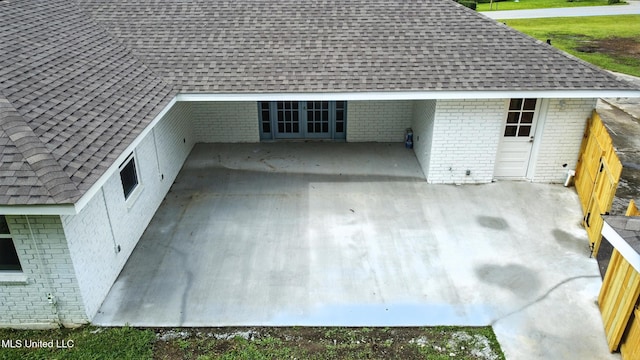 611 E E Lakeshore Dr, Carriere, MS 39426 - exterior view of brick siding and a shingled roof