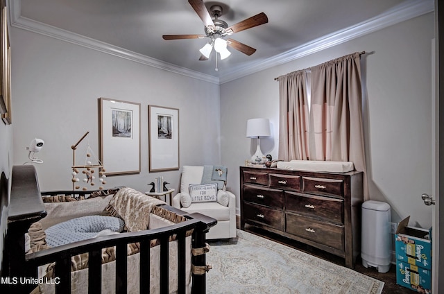 bedroom featuring crown molding and ceiling fan