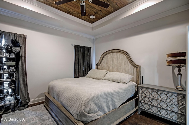 bedroom with a ceiling fan, baseboards, ornamental molding, wood ceiling, and a raised ceiling