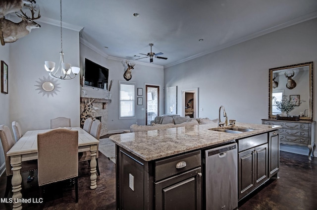 kitchen featuring a fireplace, a sink, dark brown cabinetry, concrete flooring, and dishwasher