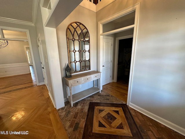 hallway featuring ornamental molding