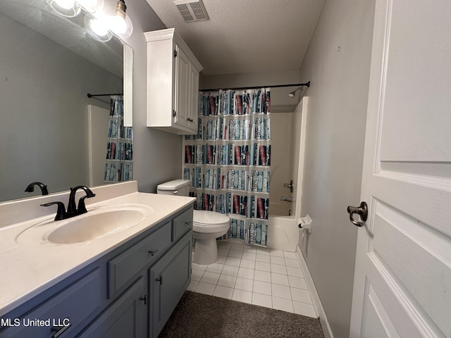 full bathroom featuring vanity, tile patterned floors, toilet, a textured ceiling, and shower / tub combo with curtain