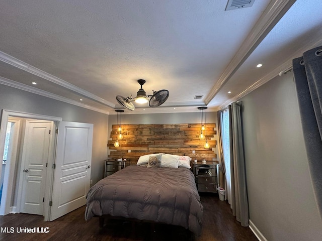 bedroom featuring ceiling fan, wood walls, dark hardwood / wood-style flooring, and ornamental molding