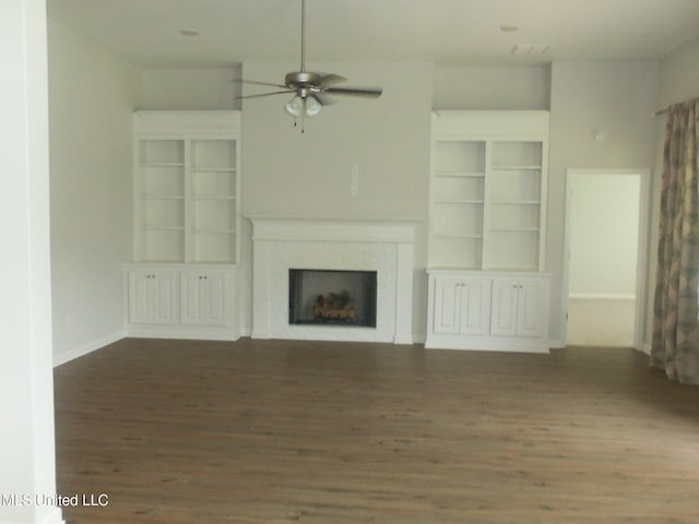 7156 Edgewater Dr, Olive Branch, MS 38654 - unfurnished living room with wood finished floors, a ceiling fan, a fireplace, and baseboards