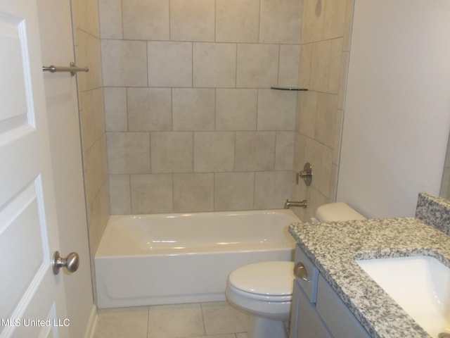 7156 Edgewater Dr, Olive Branch, MS 38654 - bathroom featuring toilet, vanity, tile patterned floors, and bathtub / shower combination