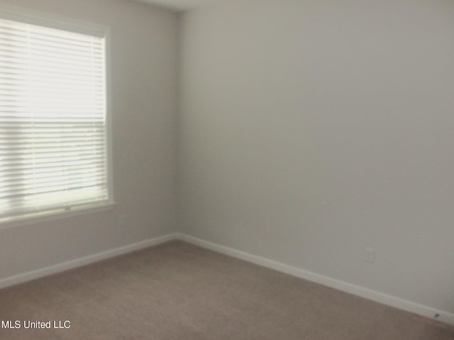 7156 Edgewater Dr, Olive Branch, MS 38654 - carpeted spare room with baseboards