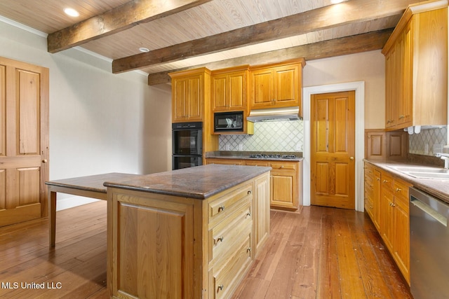 kitchen featuring black appliances, hardwood / wood-style flooring, decorative backsplash, a kitchen island, and wood ceiling