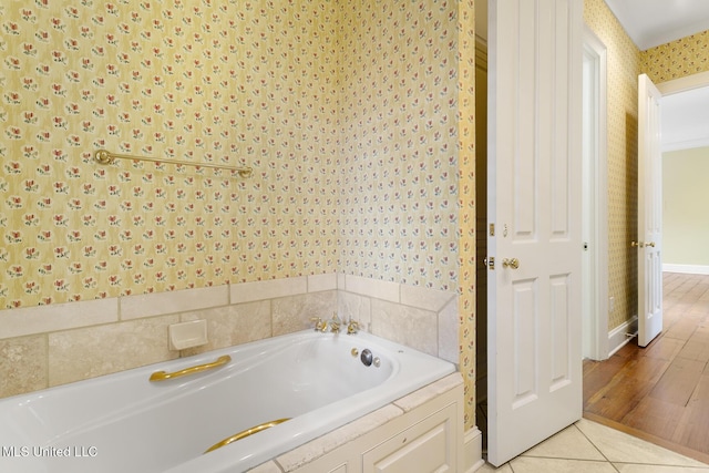 bathroom featuring tile patterned floors and a bathtub