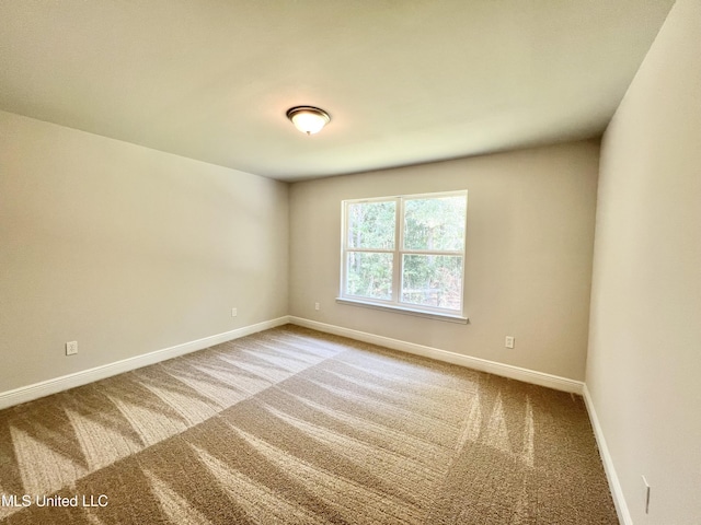 15693 Perdido Dr, Gulfport, MS 39503 - carpeted empty room with baseboards