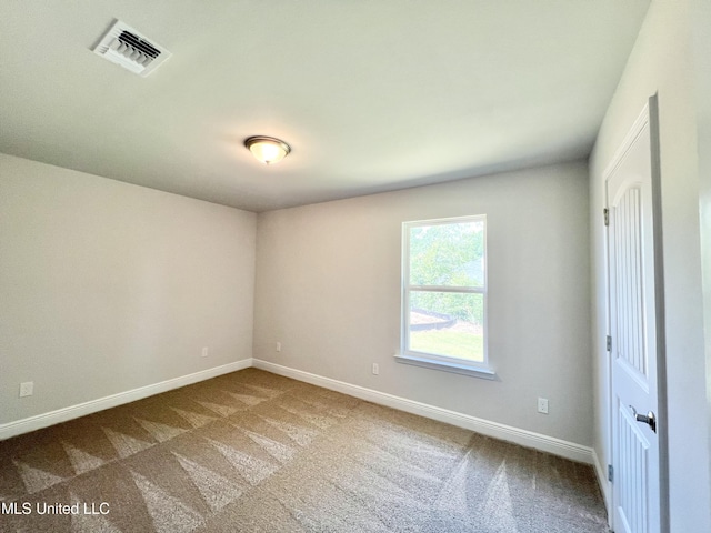 15693 Perdido Dr, Gulfport, MS 39503 - carpeted spare room with baseboards and visible vents