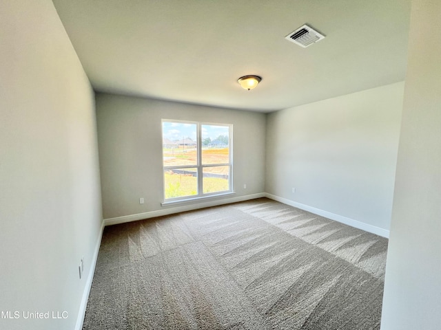 15693 Perdido Dr, Gulfport, MS 39503 - unfurnished room featuring baseboards, visible vents, and carpet