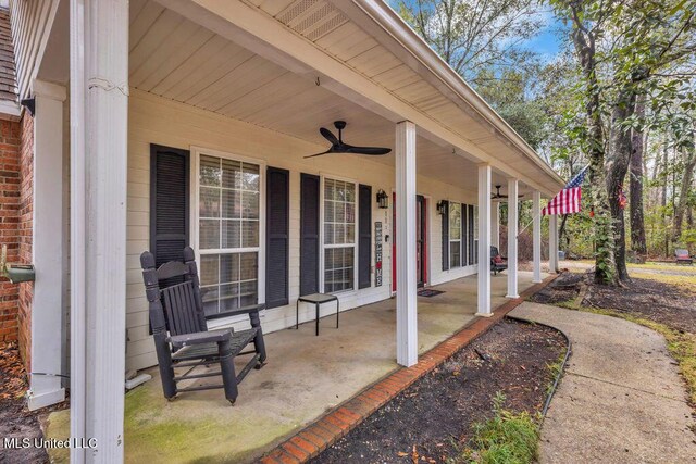 view of patio with a porch and a ceiling fan