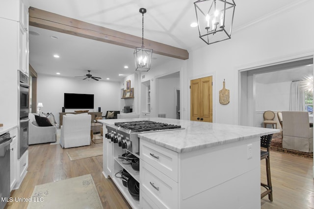 3844 Hawthorn Dr, Jackson, MS 39216 - kitchen with ceiling fan with notable chandelier, recessed lighting, white cabinets, light stone countertops, and a kitchen island