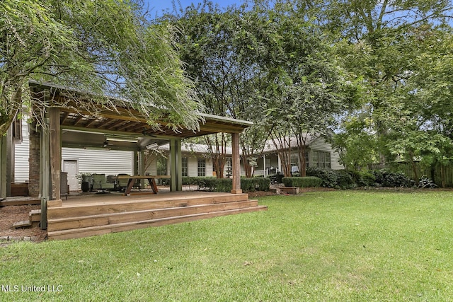 3844 Hawthorn Dr, Jackson, MS 39216 - view of yard with a deck, a ceiling fan, and fence