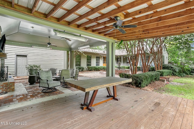 wooden terrace featuring ceiling fan