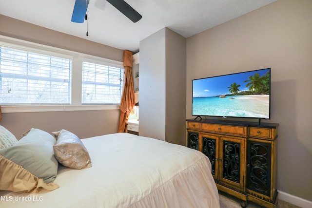 bedroom featuring ceiling fan