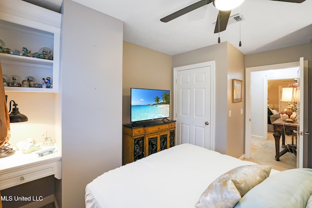 carpeted bedroom with ceiling fan