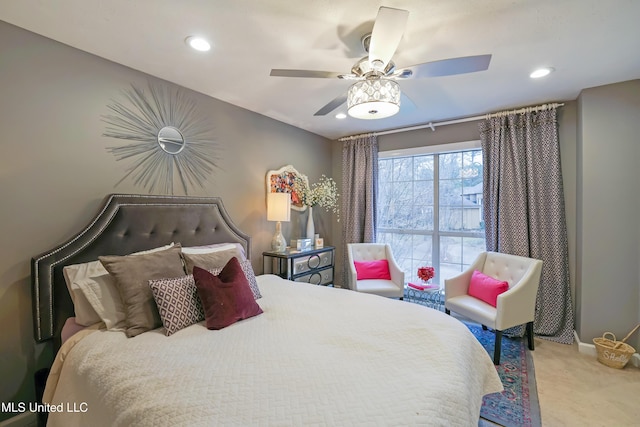 carpeted bedroom with ceiling fan