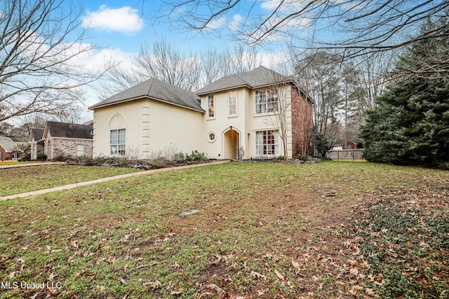 view of front property with a front lawn