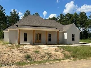 back of house with a porch