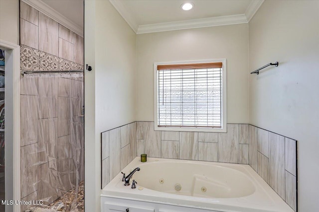 full bathroom with a whirlpool tub, crown molding, and a tile shower