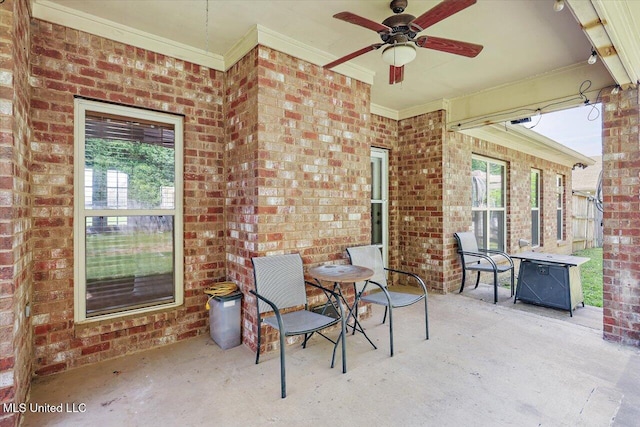 view of patio / terrace featuring ceiling fan