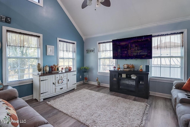 11162 New York St, Bay Saint Louis, MS 39520 - living room featuring vaulted ceiling, crown molding, ceiling fan, plenty of natural light, and baseboards