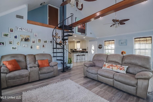 11162 New York St, Bay Saint Louis, MS 39520 - living area featuring a ceiling fan, stairs, high vaulted ceiling, wood finished floors, and beamed ceiling