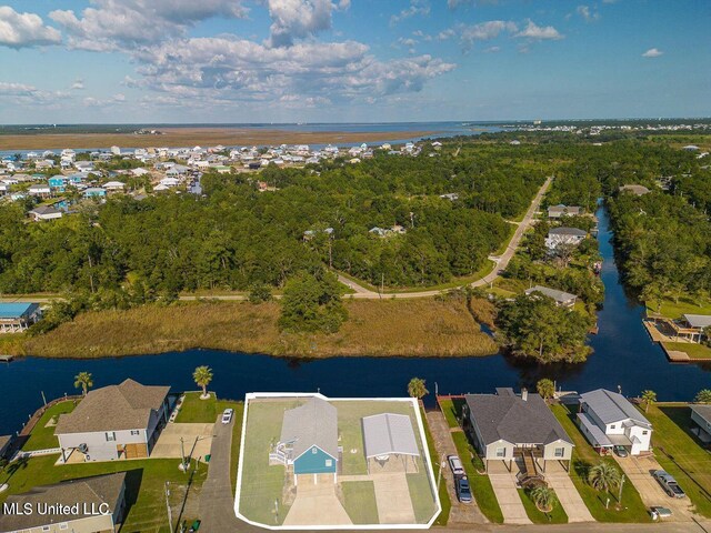 11162 New York St, Bay Saint Louis, MS 39520 - aerial perspective of suburban area featuring a nearby body of water
