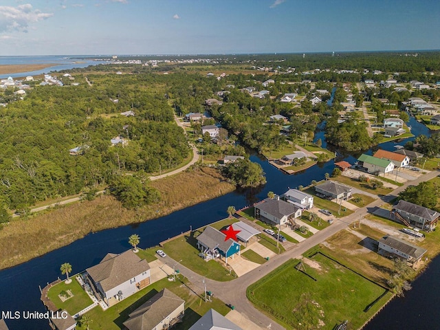 11162 New York St, Bay Saint Louis, MS 39520 - aerial view of property and surrounding area with a nearby body of water and nearby suburban area