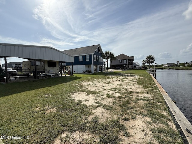 11162 New York St, Bay Saint Louis, MS 39520 - dock with a water view and a lawn