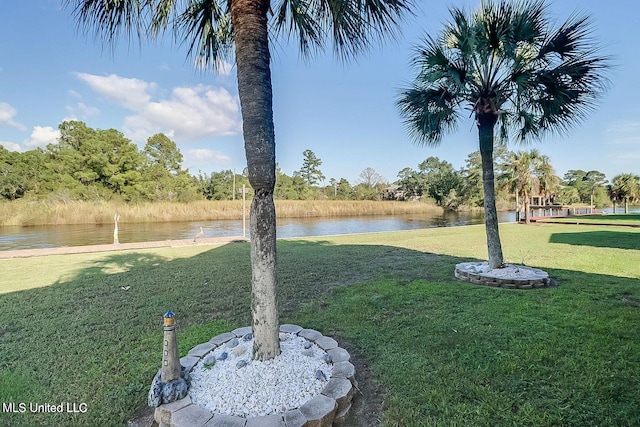 11162 New York St, Bay Saint Louis, MS 39520 - view of grassy yard featuring a water view