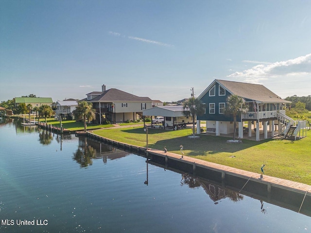 11162 New York St, Bay Saint Louis, MS 39520 - dock area featuring a water view, stairs, a lawn, and a residential view