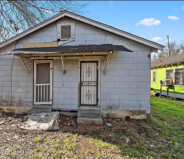 exterior space with entry steps and cooling unit