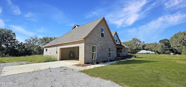 view of property exterior featuring a garage and a lawn