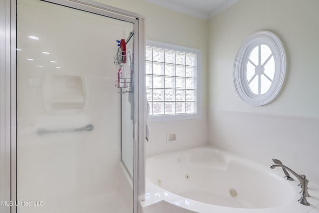 bathroom featuring independent shower and bath and ornamental molding