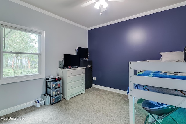 bedroom with crown molding, light carpet, and ceiling fan