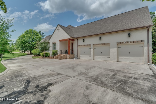 view of property exterior featuring a garage