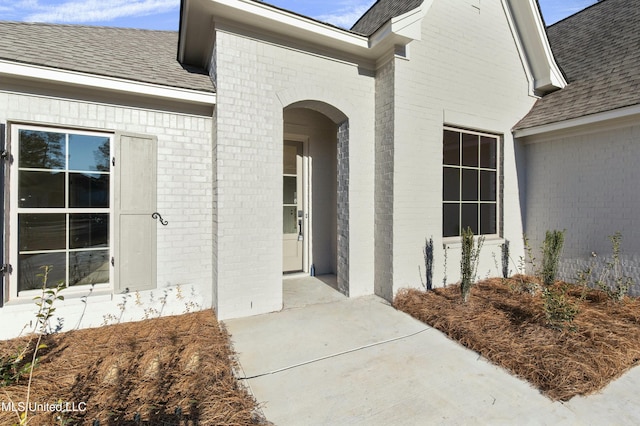 doorway to property featuring a patio area