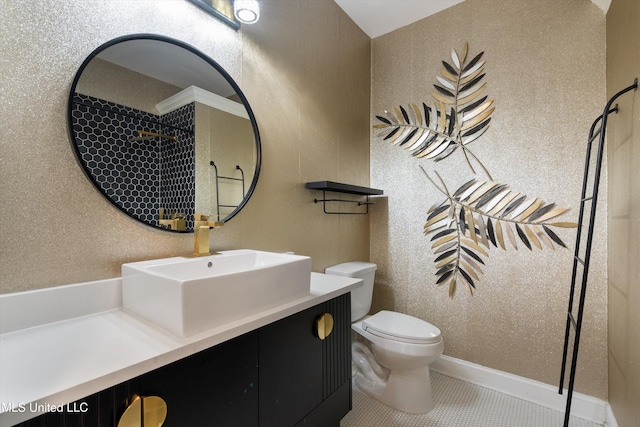 bathroom with tile patterned floors, toilet, and vanity