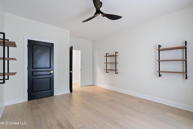 unfurnished room featuring ceiling fan and light hardwood / wood-style flooring