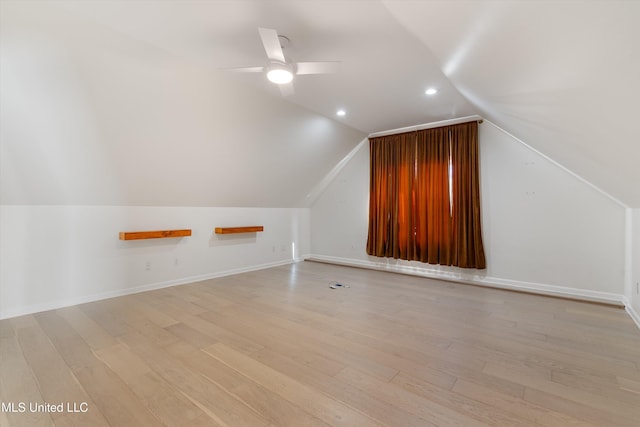 bonus room with ceiling fan, light hardwood / wood-style flooring, and lofted ceiling