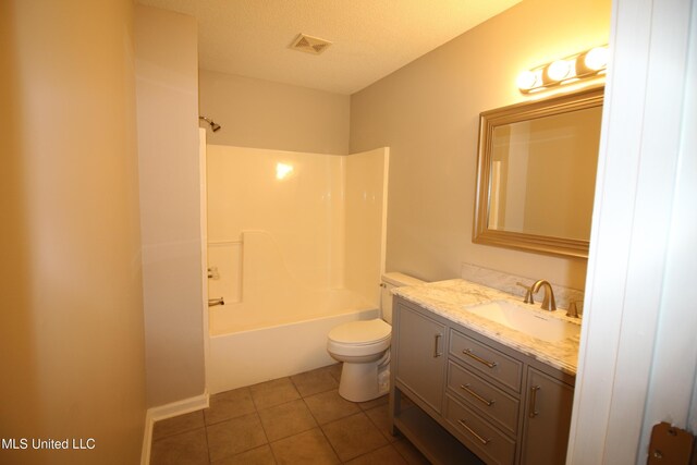 bathroom with tile patterned flooring, visible vents, toilet, bathtub / shower combination, and vanity