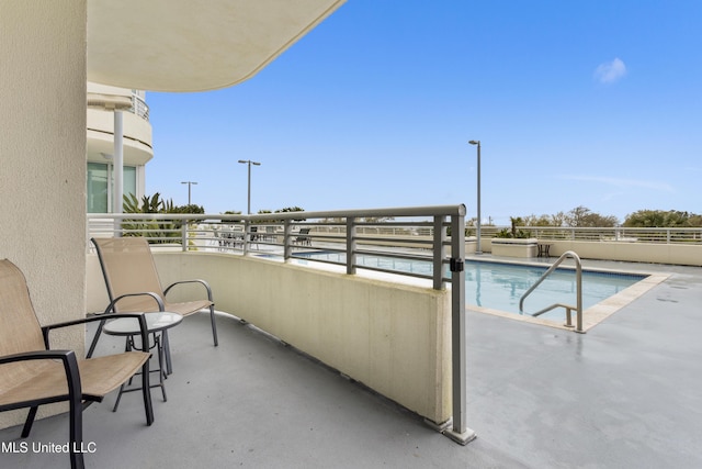 2060 Beach Blvd Unit 102, Biloxi, MS 39531 - balcony featuring view of pool