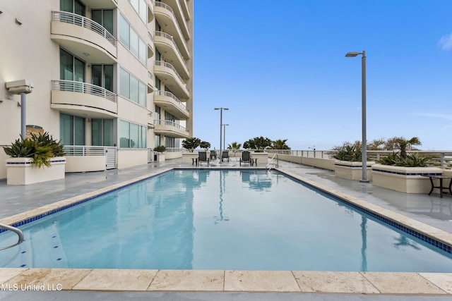 2060 Beach Blvd Unit 102, Biloxi, MS 39531 - community pool featuring a patio area