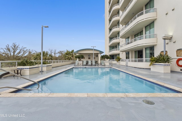 2060 Beach Blvd Unit 102, Biloxi, MS 39531 - community pool with a patio area